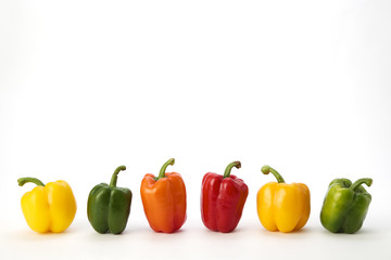 Colorful bell pepper vegetable on white background