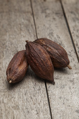 cocoa fruit on rustic wooden background