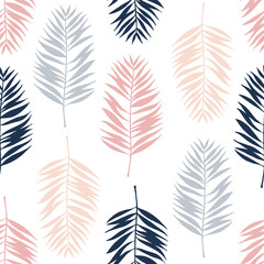 Seamless pattern with exotic palm leaves.