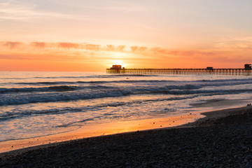 Palm Trees Beach Waves and Surf at Sunset in Oceanside San Diego California