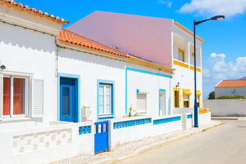 Street with typical  Portuguese white houses in Sagres,  the municipality of Vila do Bispo,  southern Algarve of Portugal.