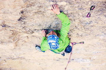 Climber climbs up