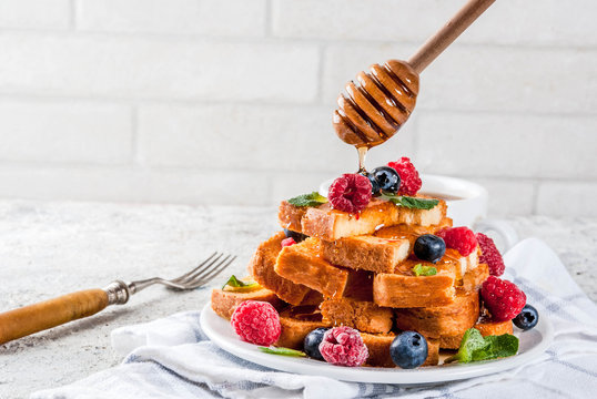 Healthy Summer Breakfast, Baked French Toasted Bread Sticks With Fresh Berry And Honey, Morning Light Grey Stone Background Copy Space