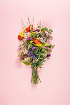 Wild Flower Bouquet On Pastel Color Background