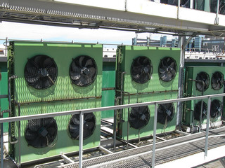 Large industrial power fans on the roof of the building. Hot air cooling