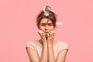 Depressed sorrowful female going to have sleep, feels miserable after quarrel with husband, cries,...