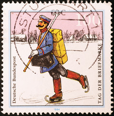 Postman with ice skates on german postage stamp