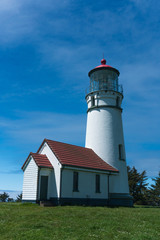 Fototapeta na wymiar Cape Blanco Lighthouse on a beautiful sunny day near Bandon on the Oregon Coast