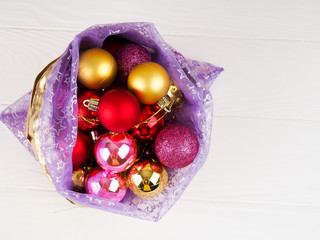 Full bag of gift boxes . Christmas ball ornaments. Time to make surprises, Christmas gift box and color balls