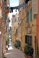 old stone street and houses Corfu town Greece