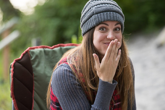 Woman Eating With A Full Mouth