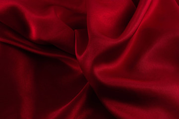 Obraz premium Abstract silk luxury background, piece of cloth, deep red cloth texture