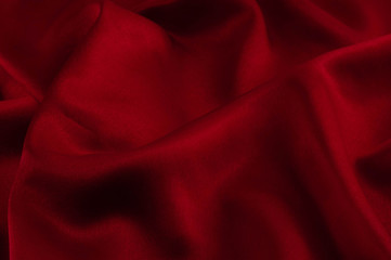 Obraz premium Abstract silk luxury background, piece of cloth, deep red cloth texture