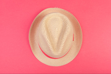 Sun hat on color background.