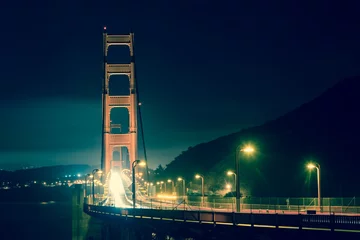 Fotobehang Golden Gate bridge bei Nacht vintage © dietwalther
