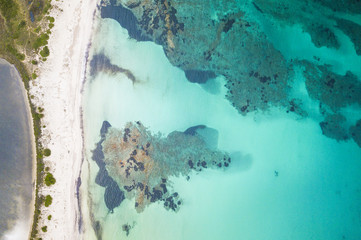 Aerial view of the Sardinian Emerald Coast, with its turquoise sea. in Sardinia Island, is one of...