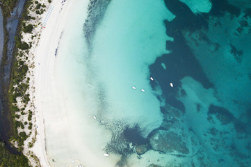 Aerial view of the Sardinian Emerald Coast, with its turquoise sea. in Sardinia Island, is one of...