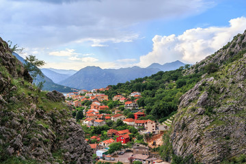Panoramic view from above on the old city Kotor, bay in Adriatic sea and mountains in Montenegro at...