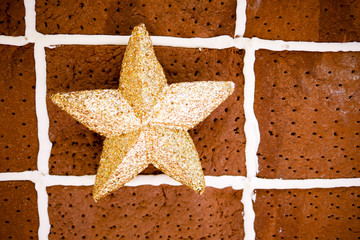 star gift box on brown bread background in Christmas celebration