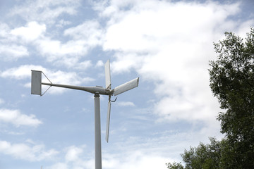 A wind turbine is a device that converts the wind's kinetic energy into electrical energy. 