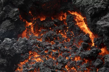 Wandcirkels tuinposter Close-up of a lava flow of volcano Kilauea on Hawaii © Fredy Thürig