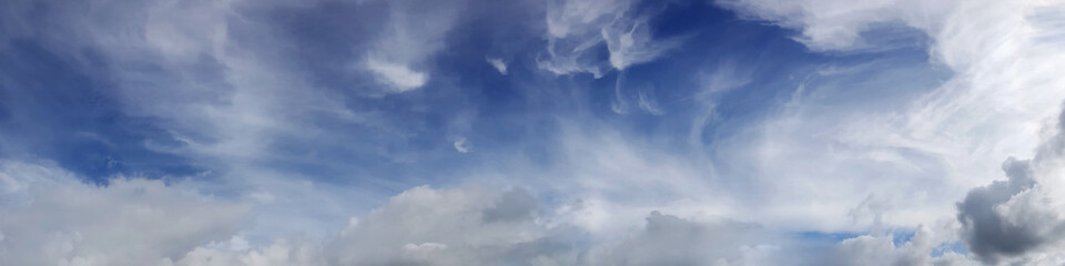 Fototapeta na wymiar Vibrant color panoramic sky with cloud on a cloudy day. Beautiful cirrus cloud.