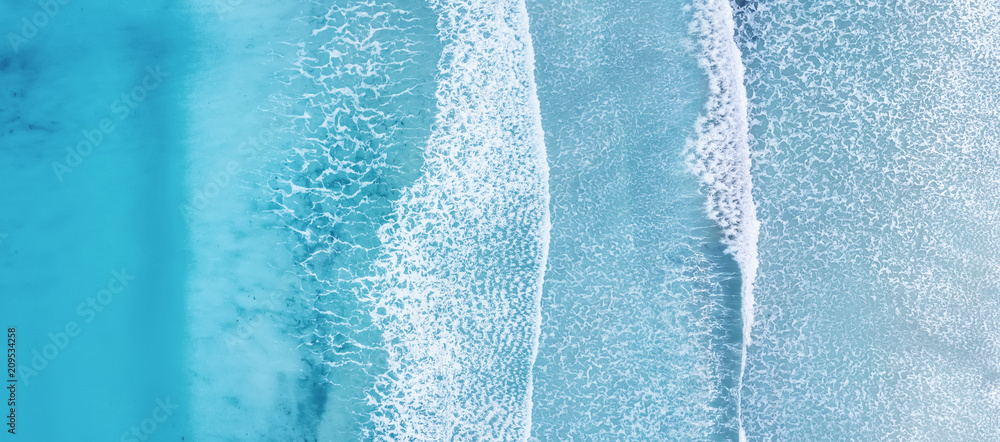 Wall mural wave on the beach as a background. beautiful natural background at the summer time