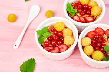 ..Healthy breakfast on white bowls.