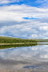 Lake with water reflections in the Swedish mountains