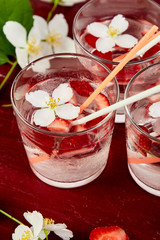 Strawberry detox water with jasmine flower.