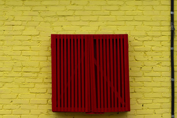 Yellow wall, red box.
