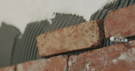 brick cuts tile on the wall closeup