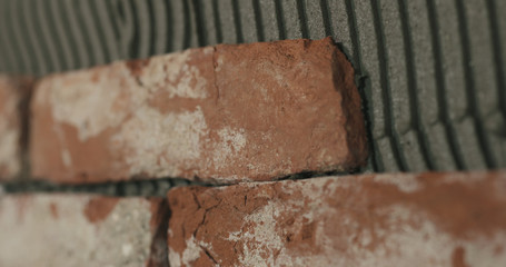 brick cuts tile on the wall closeup