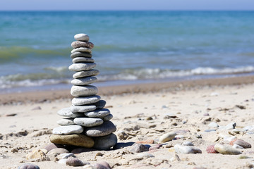 stones pyramid on the beach