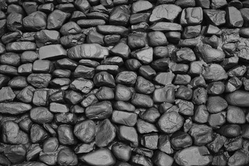 background texture of black old stone wall