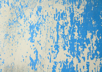 Old worn plywood blue. Scuffed sheet of plywood. Close-up. Background. Texture.