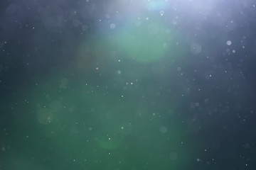 Fototapeta premium backlit real dust particles with lens flare