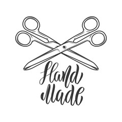 Handmade. Lettering phrase with crossed scissors. Design element for logo, label, sign.