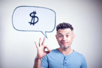 Portrait of a young man with a speech bubble dollar signe over his head