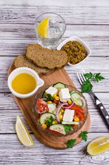 Obraz na płótnie Canvas Salad of raw vegetables in oil