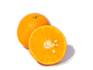 orange fruit and orange slices.