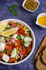 Salad of raw vegetables in oil