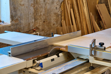Format table saw. Sawing of plywood