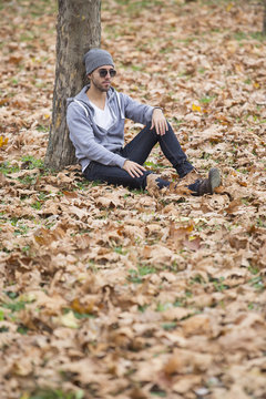 man in nature .autumn leaves.copy space