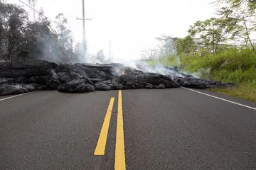 Tuinposter Highway in Hawaii, which was destroyed by a lava flow © Fredy Thürig