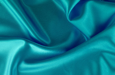 Abstract silk luxury background, piece of cloth, deep sea blue cloth texture