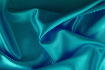 Abstract silk luxury background, piece of cloth, deep sea blue cloth texture