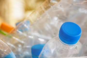 plastic bottle with caps for recycle waste,lot of water bottle waste separation concept selective focus