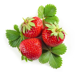 fresh red strawberries with green leaves