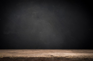 Old wood table top with smoke in the dark background